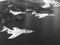 799px-F9F_Cougars_of_VA-192_and_VFP-61_over_Formosa_1957.jpg
